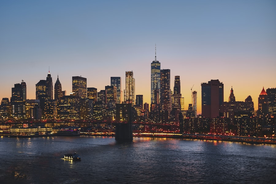 Lower Manhattan skyline at dusk seen across the East River